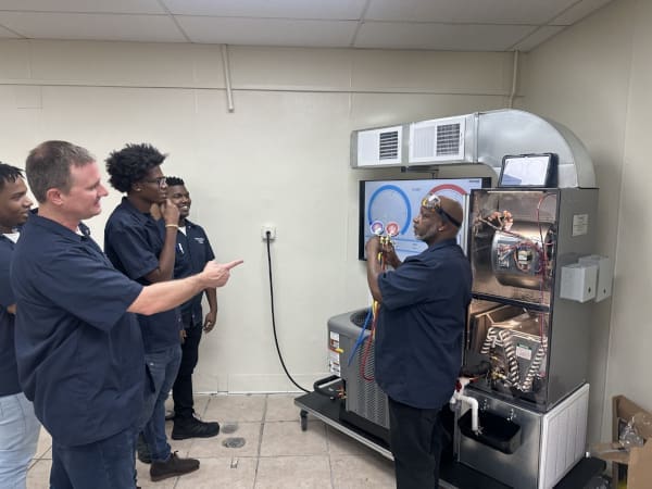 HVAC students and instructor in a classroom